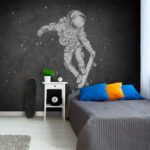 Fototapeten Ein Astronaut fährt mit dem Skateboard durch den Weltraum
