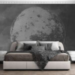 Fototapeten Strukturierter Mond mit wolkenverhangenem Hintergrund.