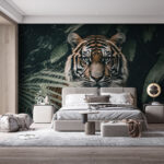 Fototapeten Tiger versteckt zwischen Dschungelblättern.