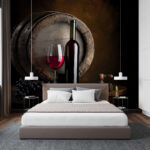 Fototapeten Weinflasche und Glas auf einem Tisch