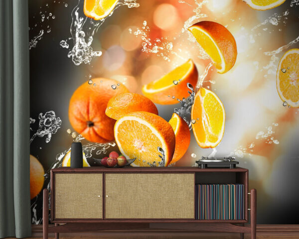 Ins Wasser fallende Orangen mit Wasserspritzern Fototapeten Ins Wasser fallende Orangen mit Wasserspritzern