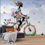 Fototapeten Frau auf einem Fahrrad mit Blumen