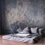 Fototapeten Texturierte Steinoberfläche mit erdigen Tönen