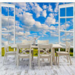 Fototapeten Fenster mit blauem Himmel und Wolken