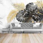 Fototapeten Lebendige Blätter vor Marmorhintergrund