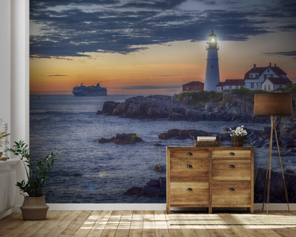 Leuchtturm an einer felsigen Küste mit einem Kreuzfahrtschiff im Hintergrund Fototapeten Leuchtturm an einer felsigen Küste mit einem Kreuzfahrtschiff im Hintergrund