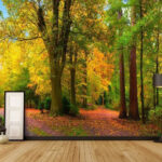 Fototapeten Bunter Herbstwald mit gewundenem Pfad