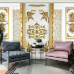 Fototapeten Weiß-goldene Wand mit verschnörkelten Motiven