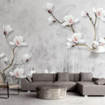 Fototapeten Zarte Magnolien an eleganten Zweigen.