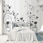Fototapeten Weiße Wand mit schwarzen und weißen Blumen