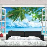 Fototapeten Fenster mit Blick auf den Strand und die Vögel