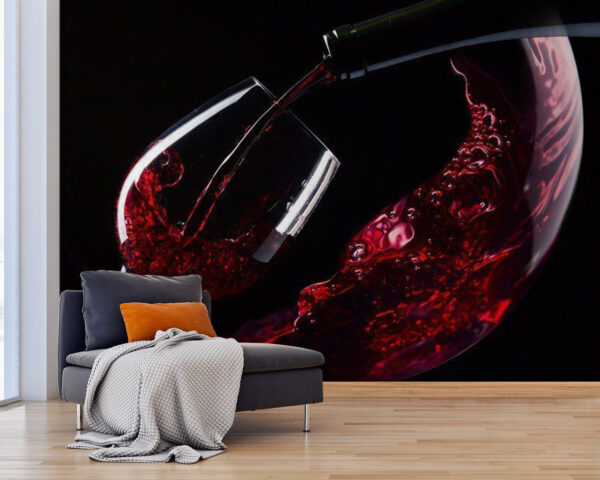 Ein Glas Rotwein wird eingeschenkt Fototapeten Ein Glas Rotwein wird eingeschenkt