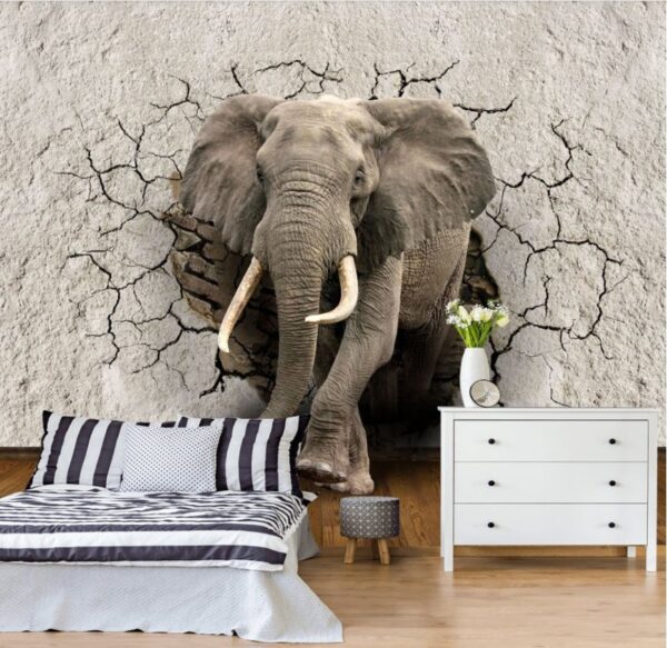 Ein Elefant, der durch die Wand bricht Fototapeten Ein Elefant, der durch die Wand bricht