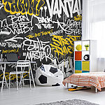 Fototapeten Gelbes Graffiti auf schwarzem Hintergrund