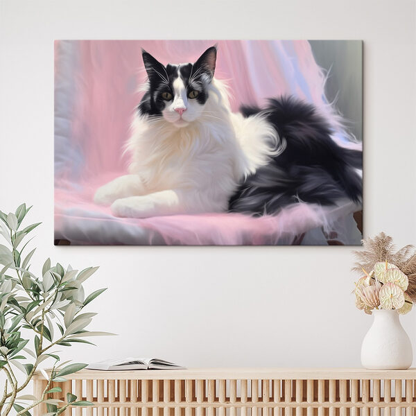 Schwarze und weiße Katze auf einer rosa Decke liegend Wandbilder Schwarze und weiße Katze auf einer rosa Decke liegend