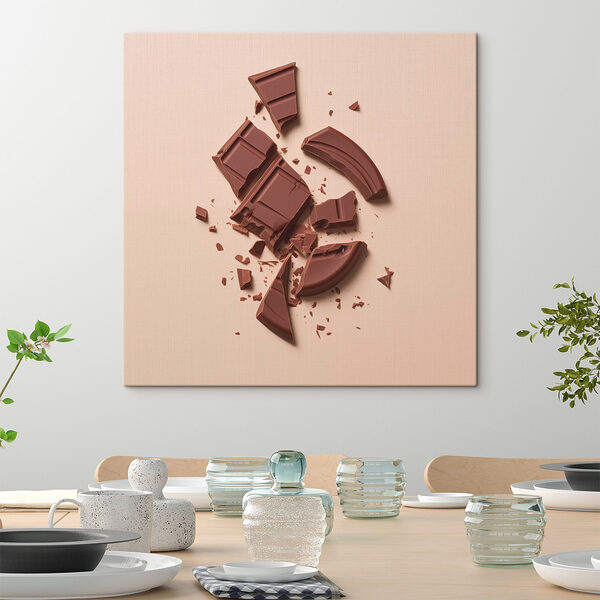 Zerbrochene Schokoladentafel auf einer rosa Fläche Wandbilder Zerbrochene Schokoladentafel auf einer rosa Fläche