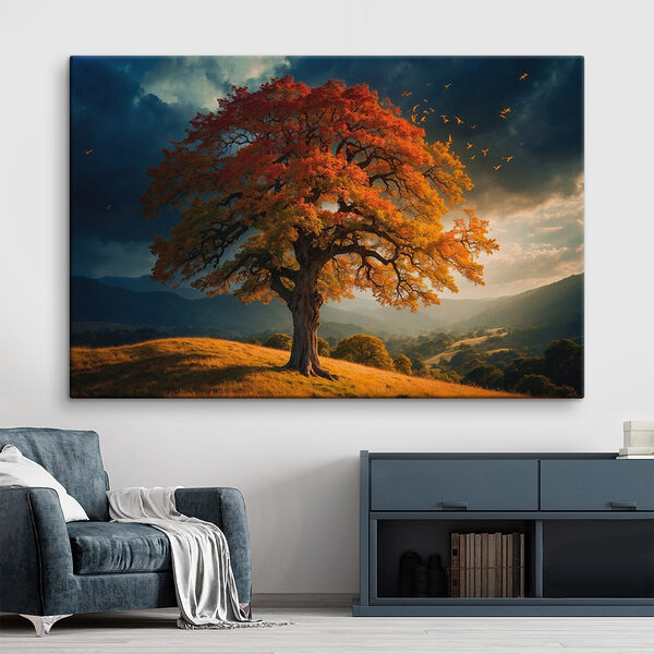 Baum mit orangefarbenen und gelben Blättern auf einem Hügel Wandbilder Baum mit orangefarbenen und gelben Blättern auf einem Hügel
