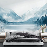 Fototapeten See umgeben von Schnee und Bergen