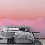 Fototapeten Rosa und blauer Himmel über einer verschneiten Bergkette