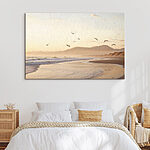Wandbilder Vögel fliegen über einen Strand
