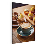 Wandbilder Tasse Kaffee und Muffins auf einem Tisch