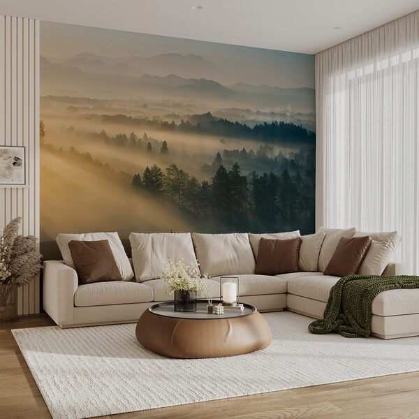 Fototapeten Neblige Landschaft mit Bäumen und Bergen