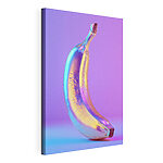 Wandbilder Bunte Banane auf violettem Hintergrund