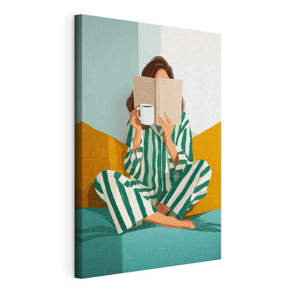 Wandbilder Wandbilder Eine Frau sitzt mit einem Buch und einer Tasse auf einem Bett (Artikelnummer: s50091)