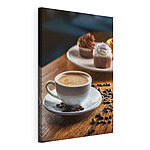 Wandbilder Tasse Kaffee und Muffins auf einem Tisch